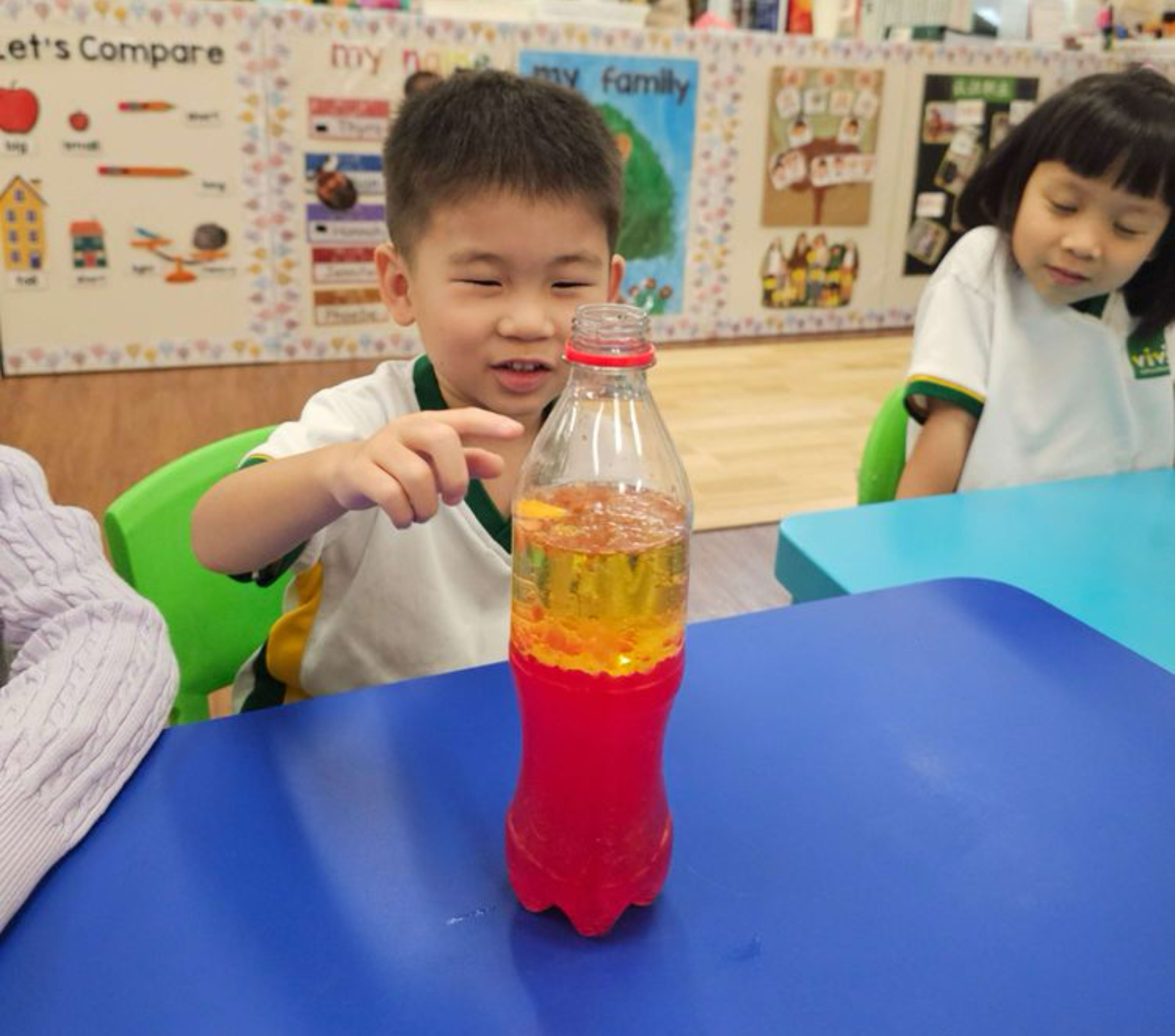 children learning chinese and english writing kindergarten